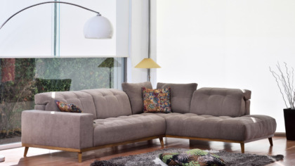 Γωνιακός καναπές υφασμάτινος μπεζ χρώματος